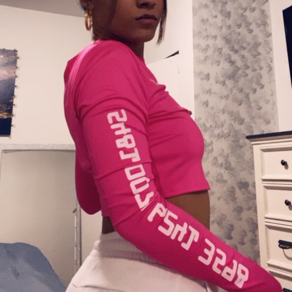 A pink long sleeve shirt